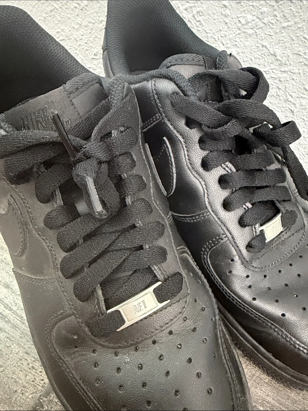 Nike All-Black Low Top Sneakers